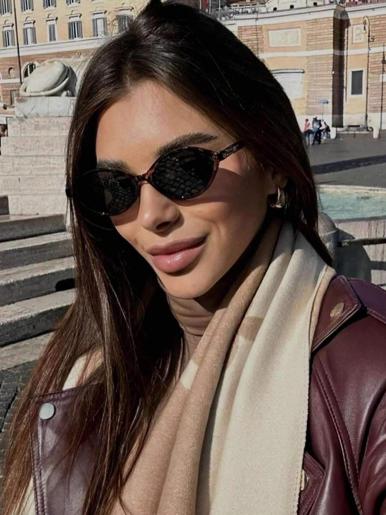 Retro Chic Black Oval Sunglasses with Gold Detail